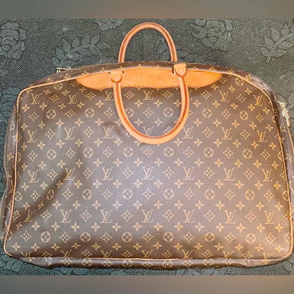 Authentic Louis Vuitton Alize Poches Monogram Travel Bag